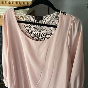 Beautiful pink dress with 3/4 sleeve and design on back